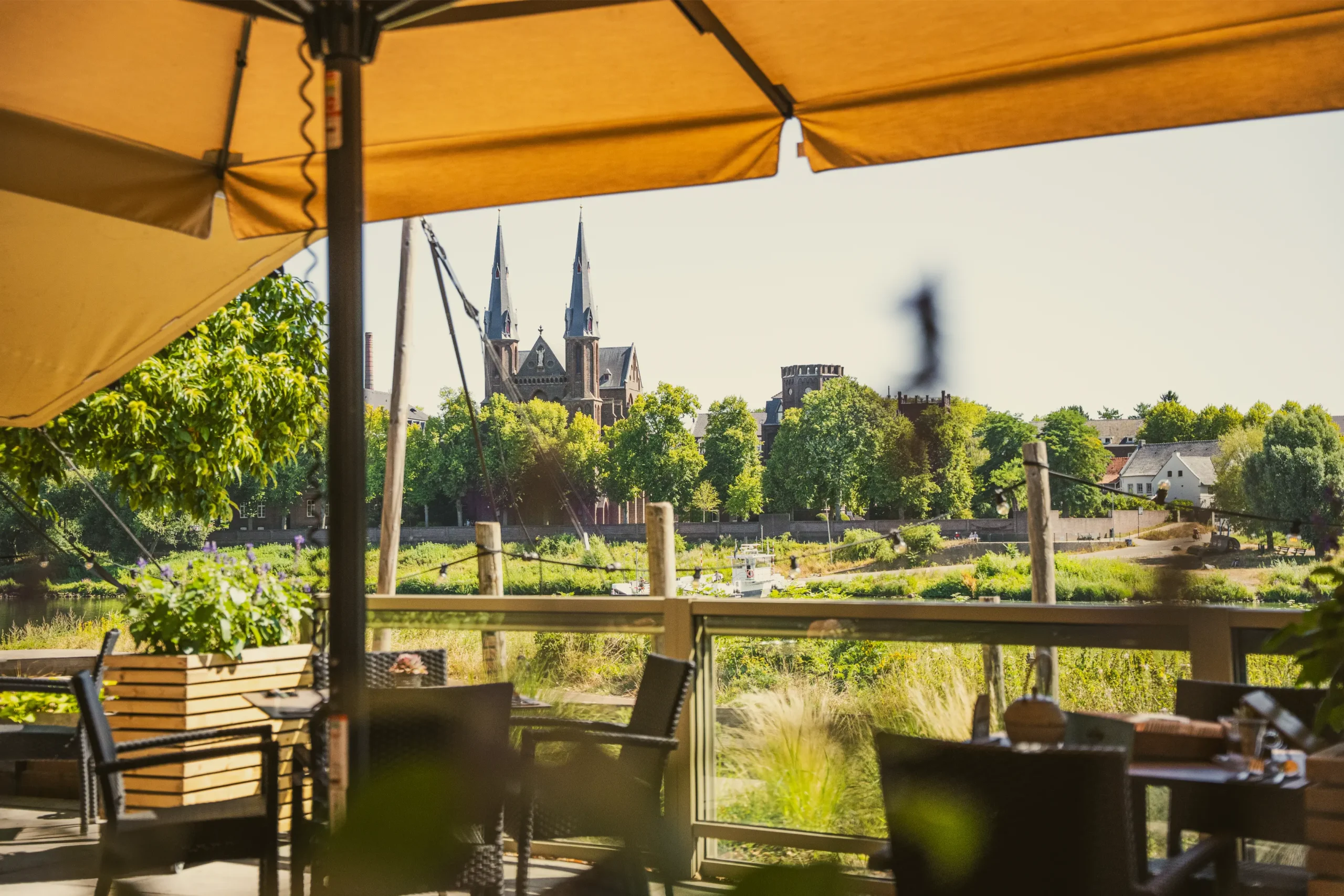 View from the terrace of Maes21 in Baarlo across the river Maas, an ideal break spot on the Maasroute